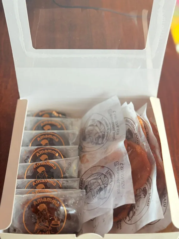 Assorted Box open with individually wrapped Malpuri and Malai Khaja